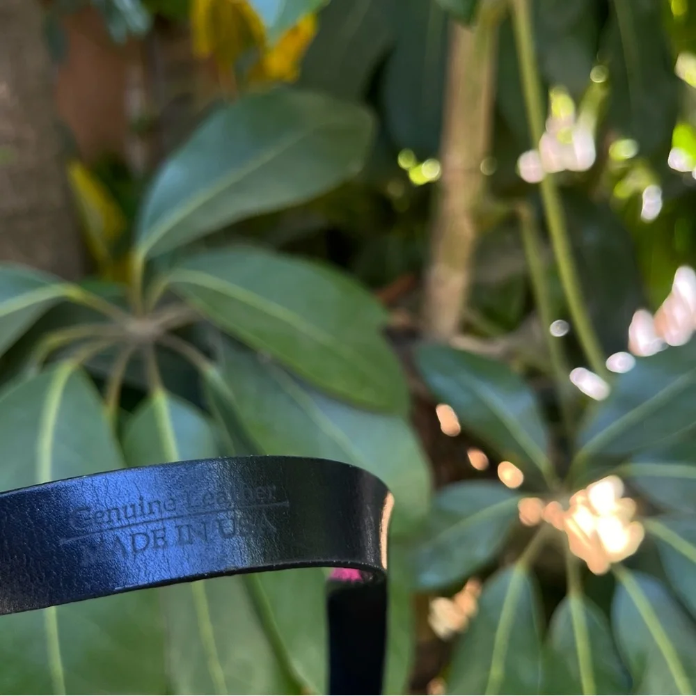 Vintage WCM New York snakeskin / python belt in pink and black.